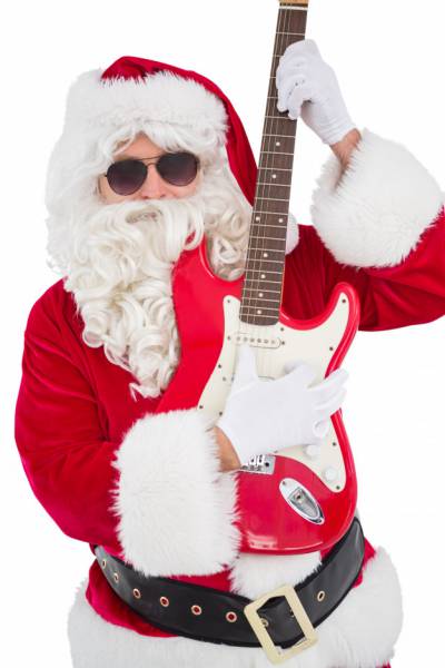 Que instrumento musical o Papai Noel está tocando? 